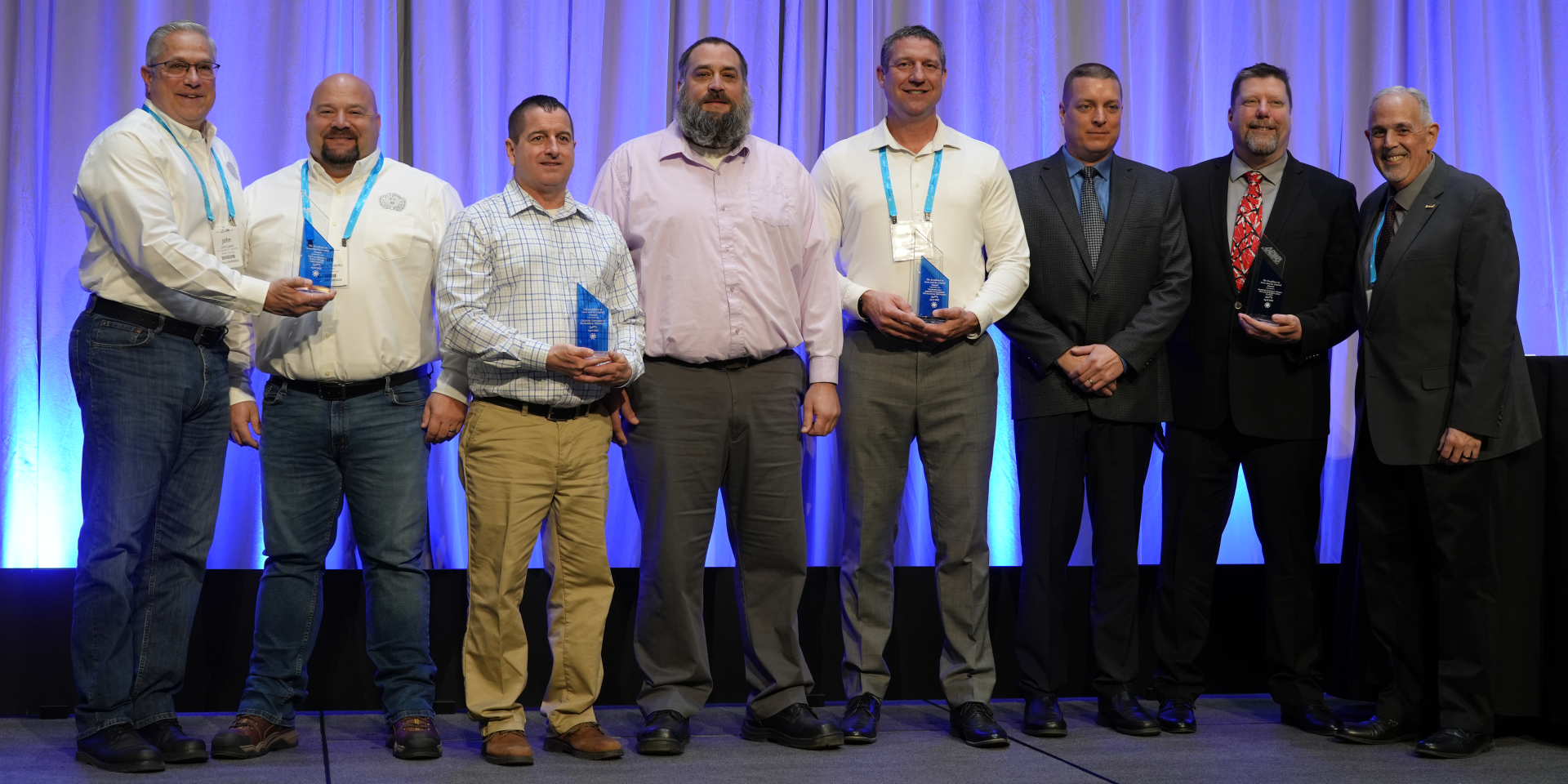 Winners of the APWA 2025 Excellence in Snow and Ice Control Awards posing for a photo at the 2025 North American Snow Conference