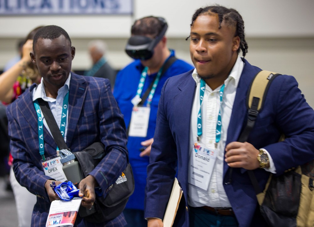 APWA Futures College Career Expo attendees walk the exhibit floor at PWX 2023 in San Diego