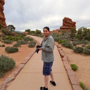 a photo of Leroy Ruiz holding his camera
