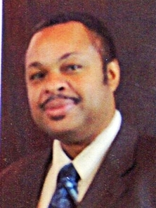 a headshot of Trent Haines