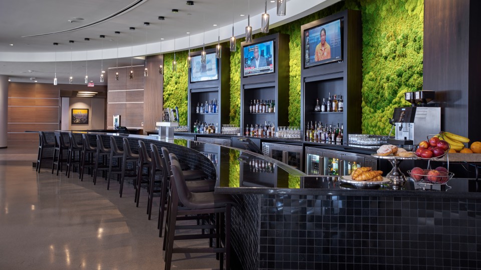 Bar with chairs and TVs at a Hilton hotel in downtown Cleveland, Ohio.