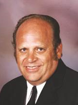a headshot of Edgar "Ed" Malloy