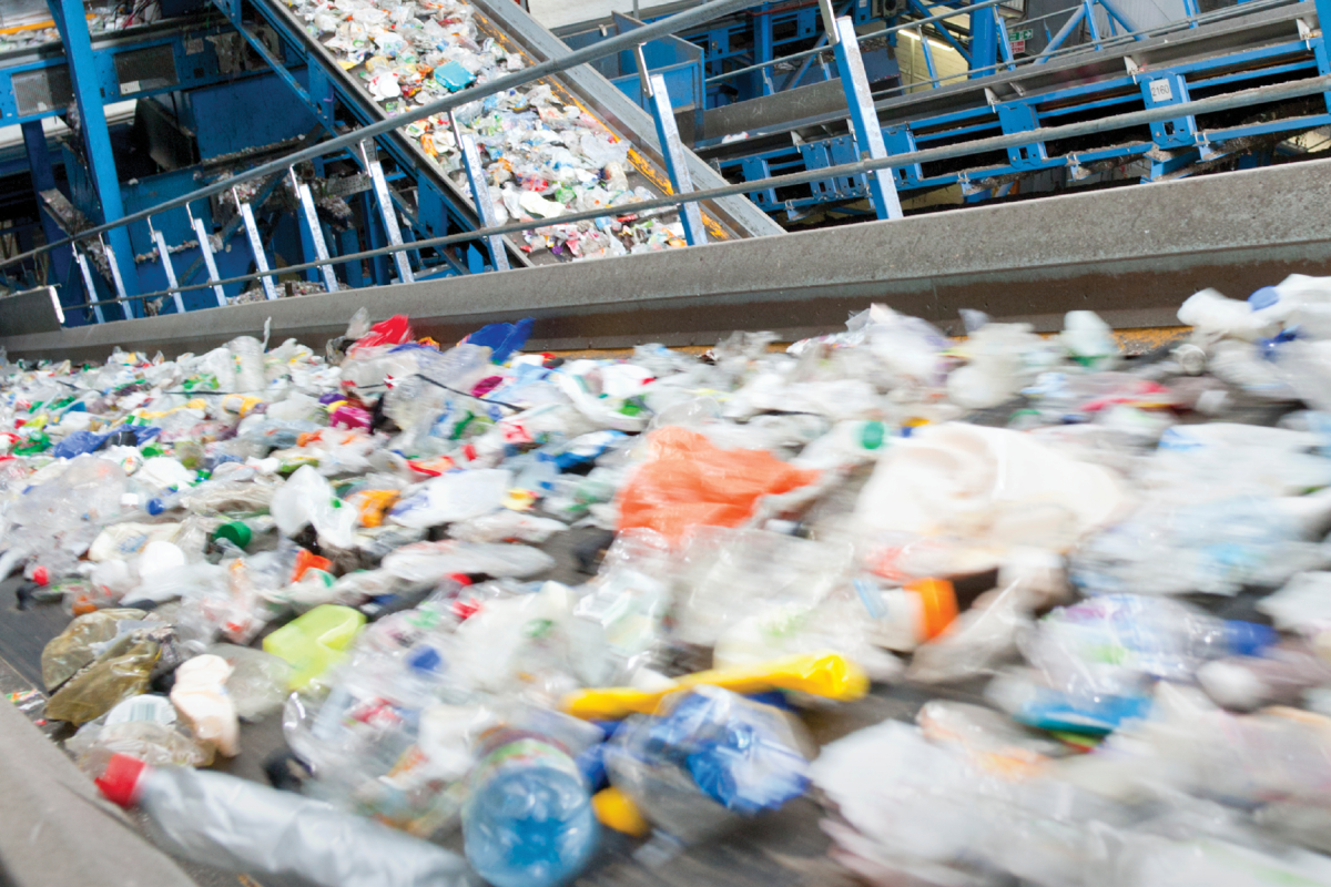 Solid waste sorting machines inside a facility.