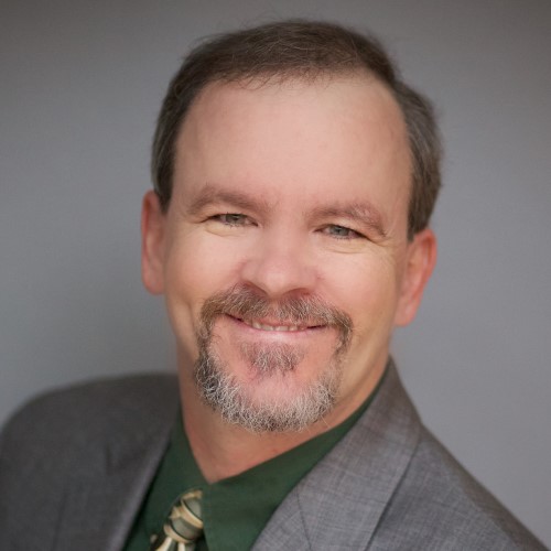 a headshot of Michael Millette
