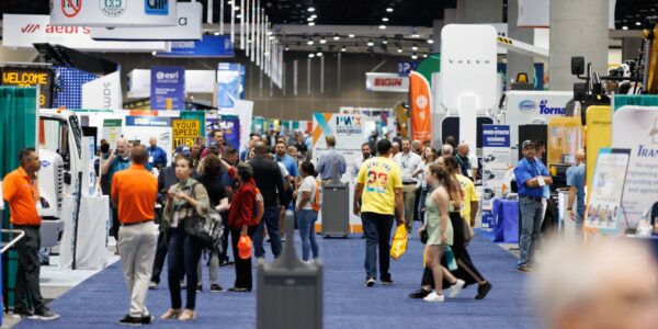 a photo of attendees on the PWX exhibit floor