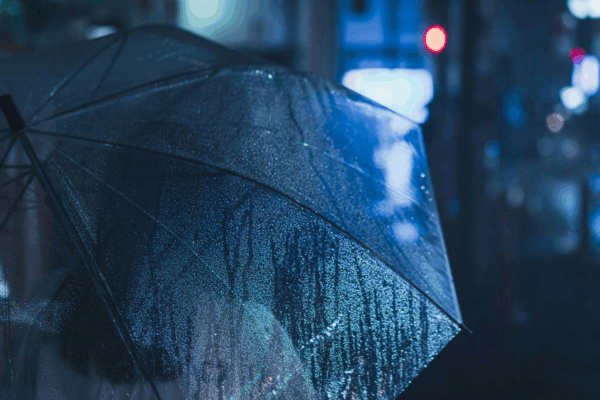 Raindrops on an umbrella.