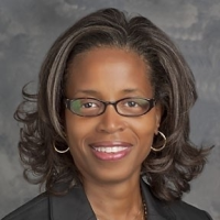A headshot of Theresa Watley.