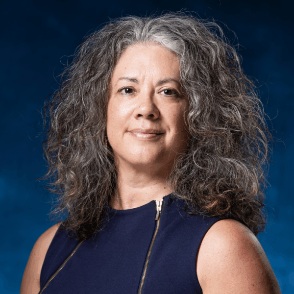 A headshot of Tracy Warner.