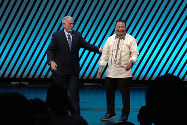 APWA President Vic Bianes on stage with APWA Past President Dominick Longobardi