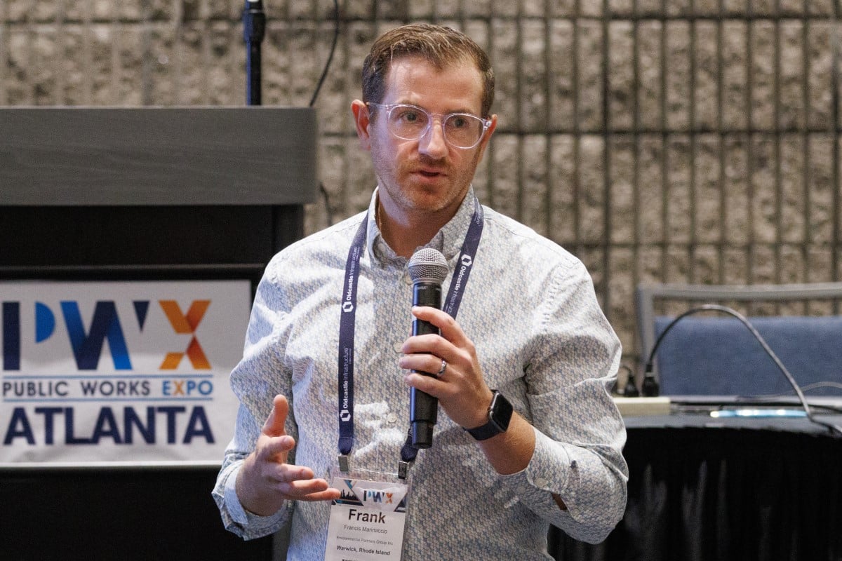 a photo of an attendee speaking at the YP Summit