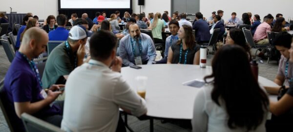 attendees participate in small group discussions at the YP Summit