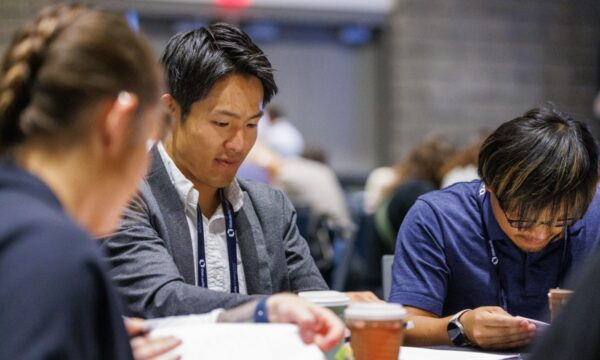 attendees participate in an activity at the YP Summit
