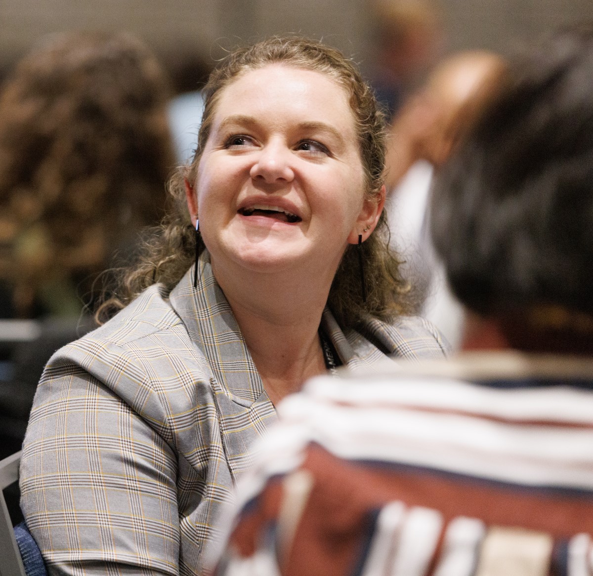 YP-Summit-Main a photo of a smiling attendee at the YP Summit