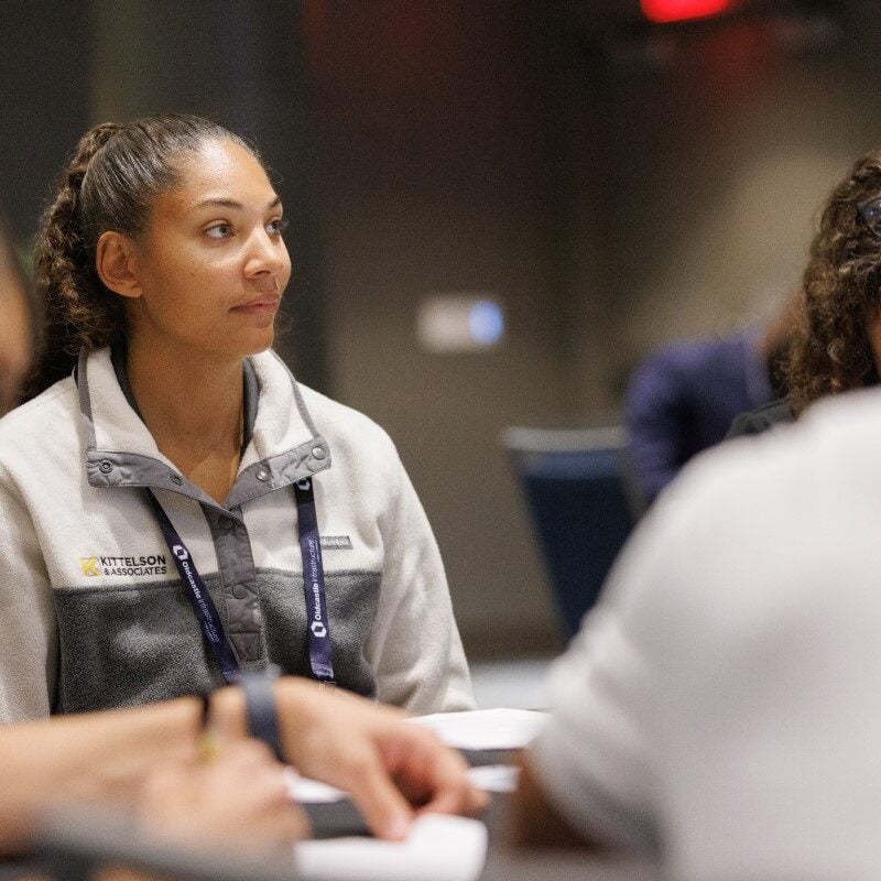 a photo of a public works professional participating in an APWA education session