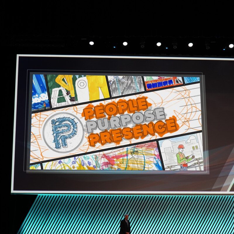 A video with the words "People Purpose Presence" on the screen at the APWA PWX Conference.