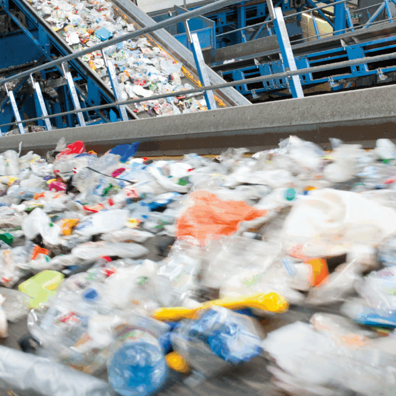 Solid waste sorting machines inside a facility.