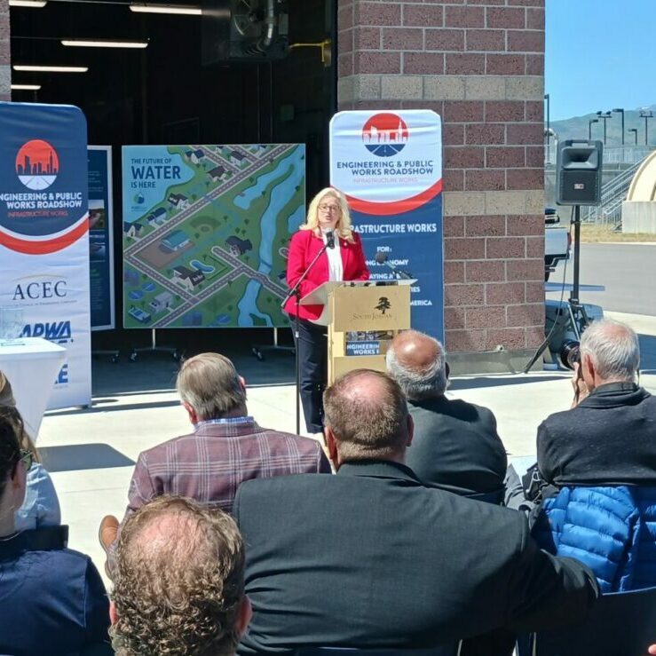 a photo of South Jordan, Utah, Mayor Dawn R. Ramsey speaking to a crowd about Pure SoJo, a water purification facility