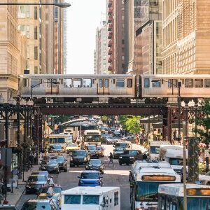 Transportation_web a photo of cars passing under an elevated railway