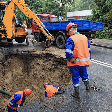 Road repairing with crane truck