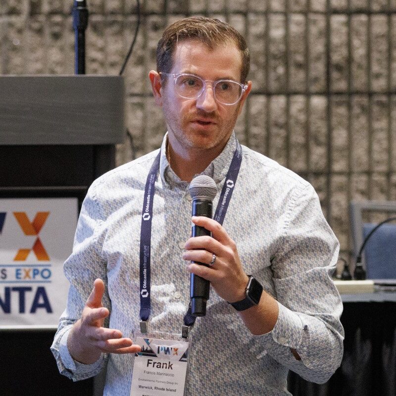 a photo of an attendee speaking at the YP Summit