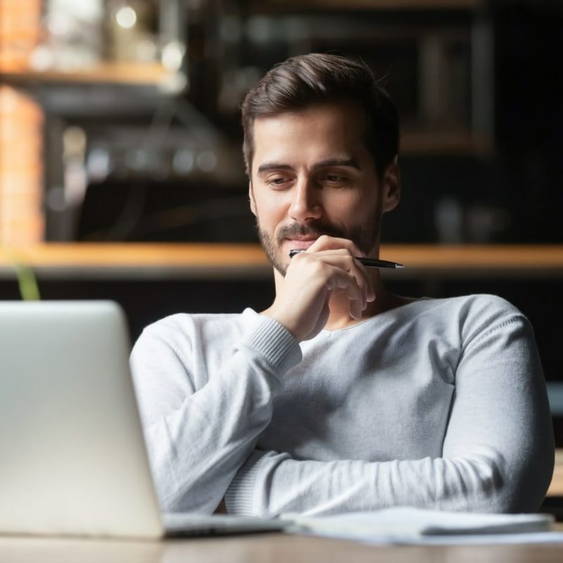 Man studying with laptop