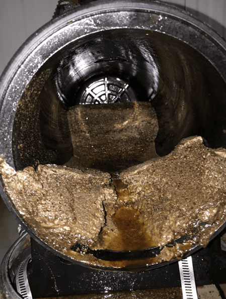 The inside of the Hydrocyclone Separators and the debris from the filter. Yellow almost muddy colour. 