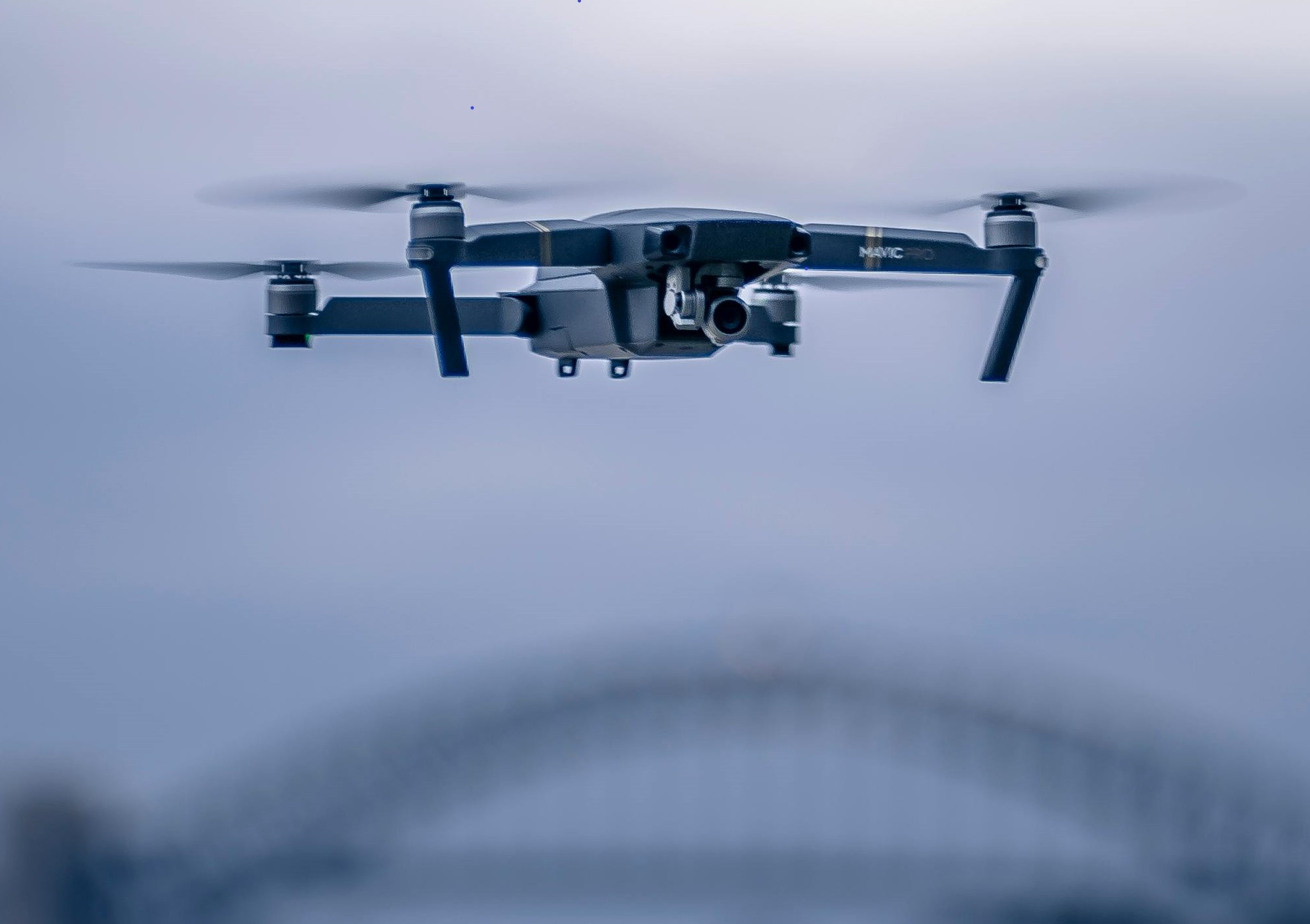 A drone flies on a cloudy day.